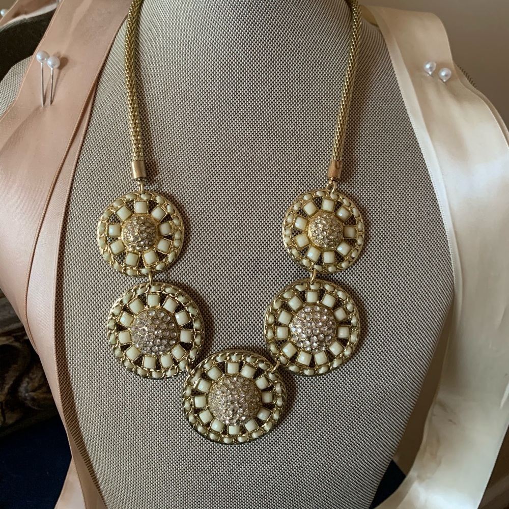 Gold and white necklace